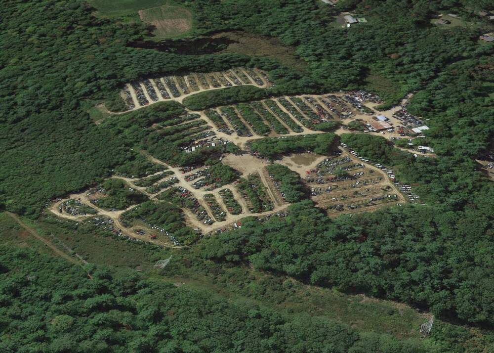 This 2017 image shows the former junkyard on Coldbrook Road in Oakham. A renewable energy developer has proposed building a 180-megawatt battery storage system on the now-empty site. (Google Earth photo)